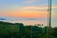 1 Bedroom Condo for Sale in The Cove Pattaya master bedroom with king-size bed
