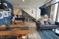2 Bedroom Condo for Sale in Baan Plai Haad living room with sofa
