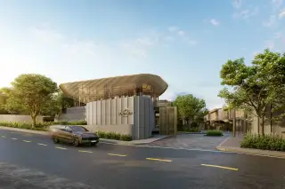 Solava Pattaya grand entrance gate with curved timber slatted canopy roof and branded signage at dusk