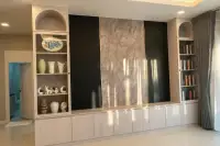 3 Bedroom House for Sale at SP Village 1 living room feature wall with built-in shelving, decorative vases and textured panel