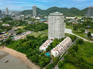 Rama Harbour View aerial view of high-rise tower, low-rise units, and beachfront