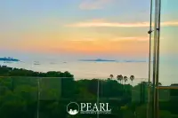 1 Bedroom Condo for Sale in The Cove Pattaya master bedroom with king-size bed