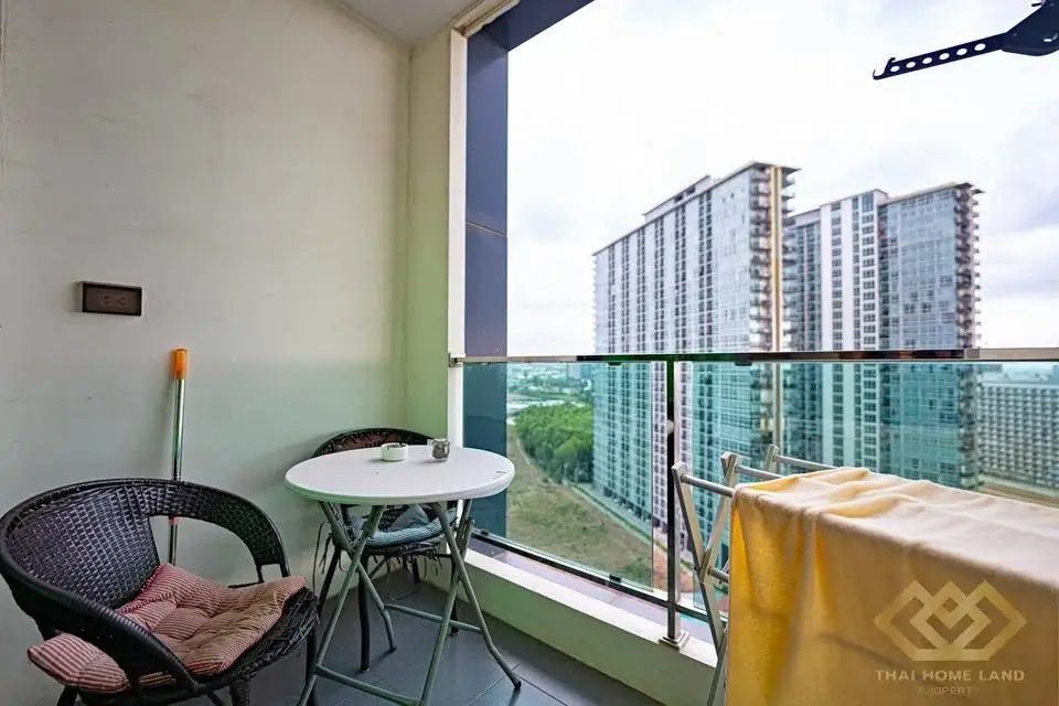 1 Bedroom Condo for Sale at Dusit Grand Condo View balcony with seating and high-rise city views