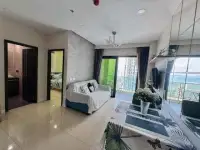 1 Bedroom Condo for Sale at Dusit Grand Condo View living room with sea view balcony and bedroom entrance