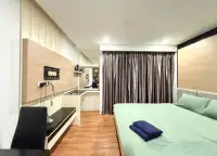 1 Bedroom Condo for Rent at Dusit Grand Park 1 bedroom view toward kitchenette and curtained window