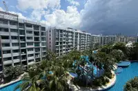 2 Bedroom Condo for Sale at Dusit Grand Park 1 aerial view of pool and tropical gardens surrounded by towers