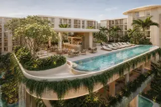 Love It Wongamat Beach elevated lap pool with poolside bar sun loungers and lush landscaped terrace