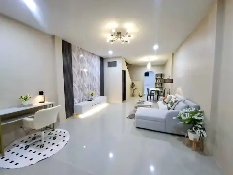 2 Bedroom Townhouse for Sale in East Pattaya open-plan living and dining area with staircase view