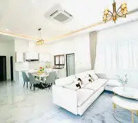 3 Bedroom House for Sale in East Pattaya open-plan living and dining area with kitchen and marble floors