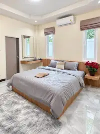4 Bedroom House for Sale & Rent in East Pattaya backyard swimming pool with yellow duck float and sun deck