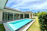 3 Bedroom House for Sale in East Pattaya corner view of pool, tiled terrace and modern exterior windows