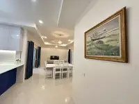 3 Bedroom House for Rent in East Pattaya hallway with framed boat artwork and open living area