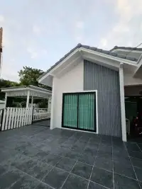 3 Bedroom House for Sale in East Pattaya exterior view of tiled patio and bedroom with sliding glass door