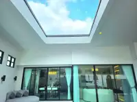 3 Bedroom House for Sale in East Pattaya skylight above living area with view of blue sky