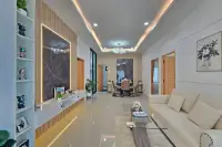 3 Bedroom House for Sale in East Pattaya hallway view of living room leading to dining area and bedrooms