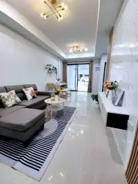 2 Bedroom Townhouse for Sale in East Pattaya hallway view with sofa and marble accent wall
