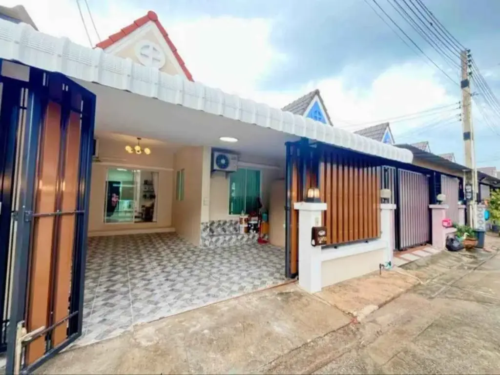 2 Bedroom Townhouse for Sale in East Pattaya exterior view with covered carport and gated entrance