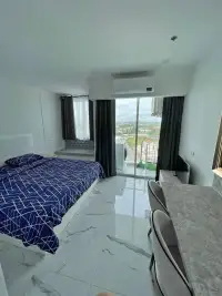Studio Condo for Sale at The Empire Tower Pattaya bed facing balcony with panoramic city view