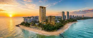 Sea Sky by Sands aerial drone view of beachfront condo towers on Pattaya coastline at golden hour