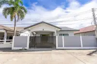 3 Bedroom House for Sale at SP Village 1 single-storey exterior with white-grey boundary wall and covered entrance porch