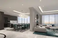 3 Bedroom Condo for Sale at Aquarous Jomtien Pattaya open-plan dining and living area with crystal chandelier and ocean view