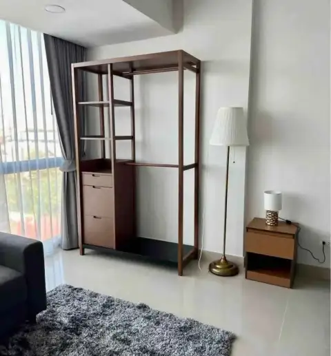 2 Bedroom Condo for Rent at Gardenia Pattaya bedroom wardrobe shelf, floor lamp, and nightstand