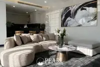 5 Bedroom Condo for Sale in Grande Caribbean spacious living room with modern decor