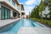 4 Bedroom House for Sale in Perla Villa spacious living room with sofa