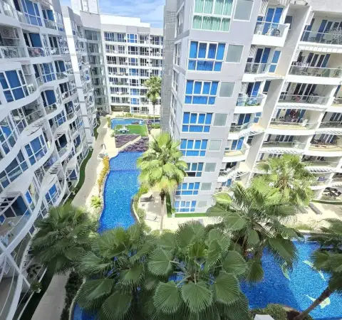 1 Bedroom Condo for Rent at Grand Avenue Residence aerial view of swimming pool and palm trees from balcony