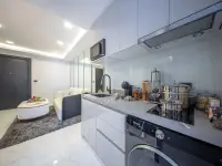 1 Bedroom Condo for Sale at Grand Solaire Noble rooftop terrace with pool deck and helipad overlooking sea