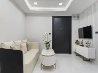 1 Bedroom Condo for Sale at Grand Solaire Noble living and dining area with mirrored wall and ocean view