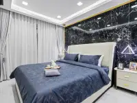 1 Bedroom Condo for Sale at Grand Solaire Noble bedroom with sea view, marble floors, and open kitchen