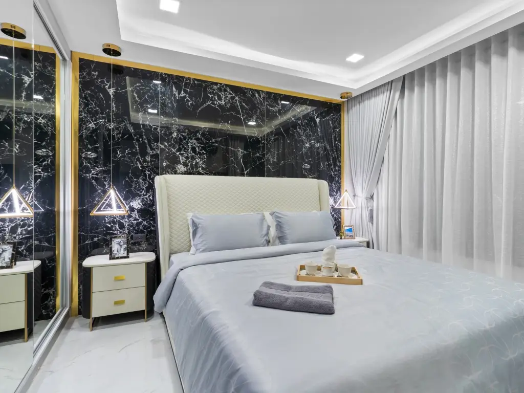 1 Bedroom Condo for Sale at Grand Solaire Noble bedroom with sea view window and marble floors