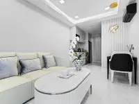 1 Bedroom Condo for Sale at Grand Solaire Noble bedroom with sea view, marble floors, and open kitchen