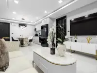 2 Bedroom Condo for Sale at Grand Solaire Noble geometric-walled cafe lounge with staircase and greenery