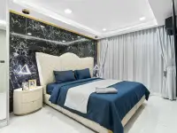 2 Bedroom Condo for Sale at Grand Solaire Noble bedroom with sea view window and marble floors