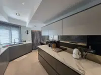 2 Bedroom Condo for Sale at Grand View Condo modern kitchen with marble island countertop and mosaic backsplash