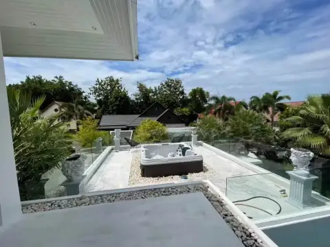 7 Bedroom House for Rent at Green Residence Village rooftop terrace with private jacuzzi and garden views