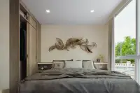 1 Bedroom Condo for Sale at Harmonia City Garden bed with gold sculptural wall decor and poolside window