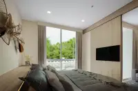 1 Bedroom Condo for Sale at Harmonia City Garden bed with decorative wall art and garden pool view