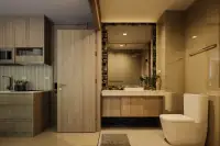 1 Bedroom Condo for Sale at Harmonia City Garden bathroom with wood vanity, mosaic mirror and glass shower next to kitchen