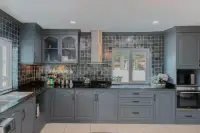 4 Bedroom House for Sale in East Pattaya kitchen with gray cabinetry and granite countertops