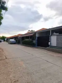 2 Bedroom House for Rent in Pong residential street view with parked cars and neighboring houses