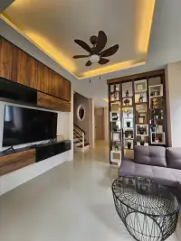 3 Bedroom House for Rent in Pong living room with wood-paneled TV wall and decorative shelf divider