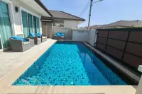 3 Bedroom House for Rent in Huai Yai with private pool, sun loungers, and poolside terrace