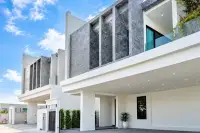 4 Bedroom House for Rent in Huai Yai modern exterior facade with marble accents and covered entrance