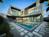 4 Bedroom House for Rent in Huai Yai modern two-story home with private pool and stone facade