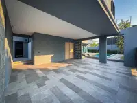4 Bedroom House for Rent in Huai Yai covered outdoor patio and walkway leading to pool area