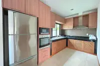 2 Bedroom House for Rent in Huai Yai modern kitchen with stainless steel fridge and oven