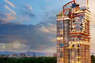 The Riviera Malibu modern high-rise building exterior against a dramatic sky with city views in the distance.